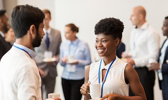 Two colleagues talking business