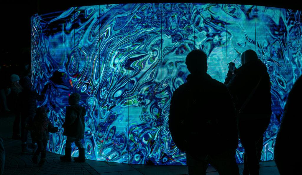 Visitors to an immersive art experience in an art gallery