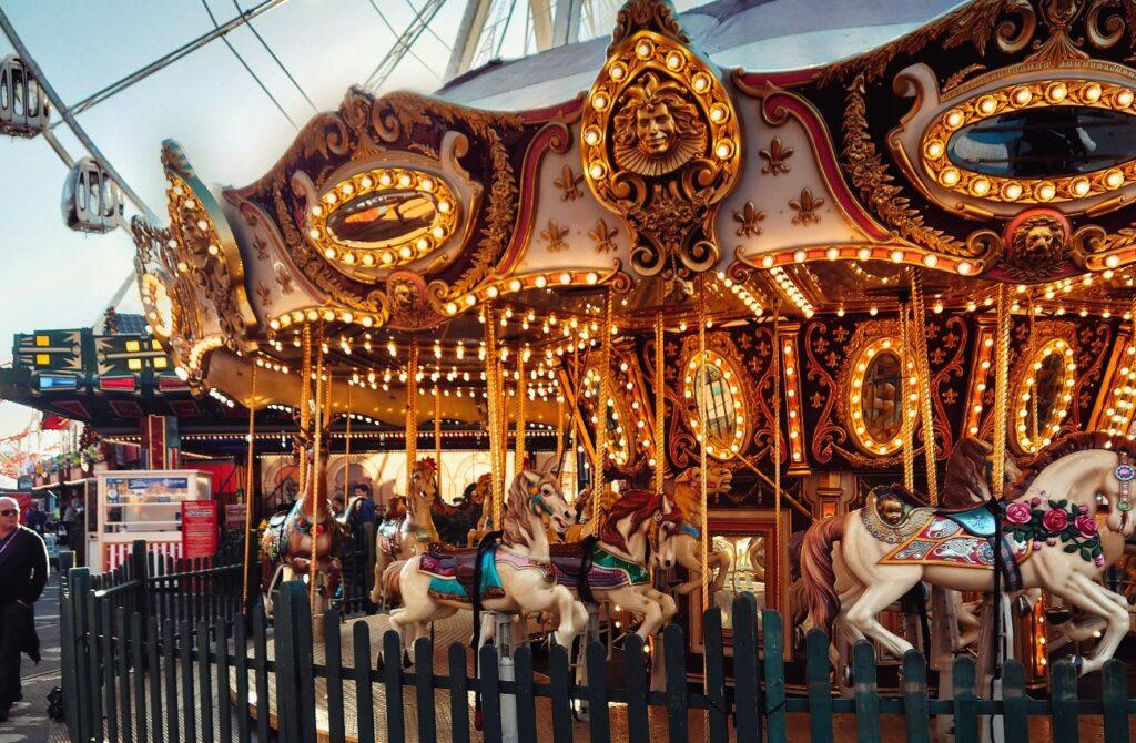 Horses in a merry-go-round at a fair